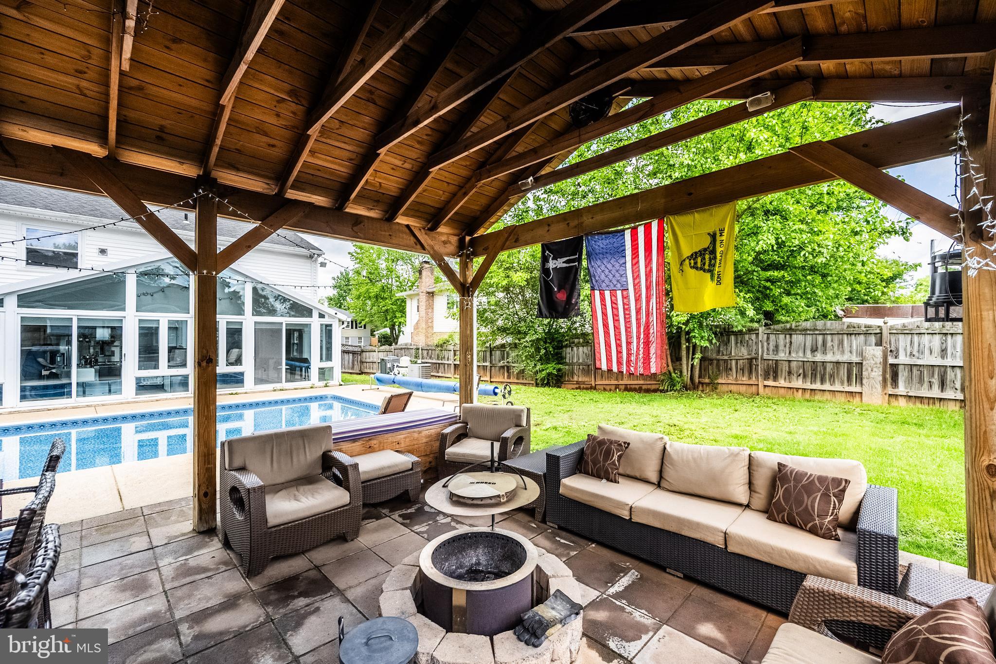 9722 Copeland Drive Manassas, VA 20109 - Photo 13 of 46 a outdoor living space with furniture and garden view