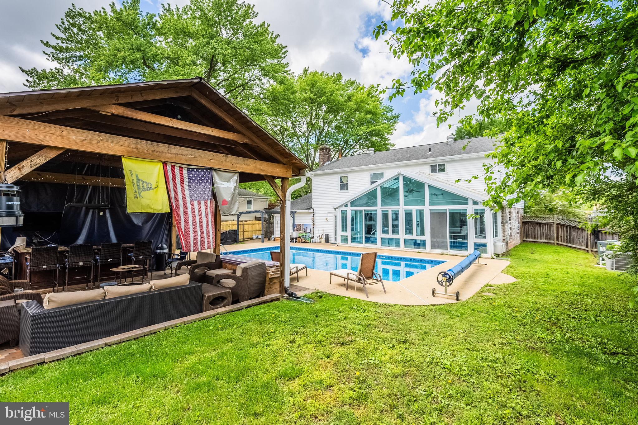 9722 Copeland Drive Manassas, VA 20109 - Photo 14 of 46 a view of a house with backyard and sitting area