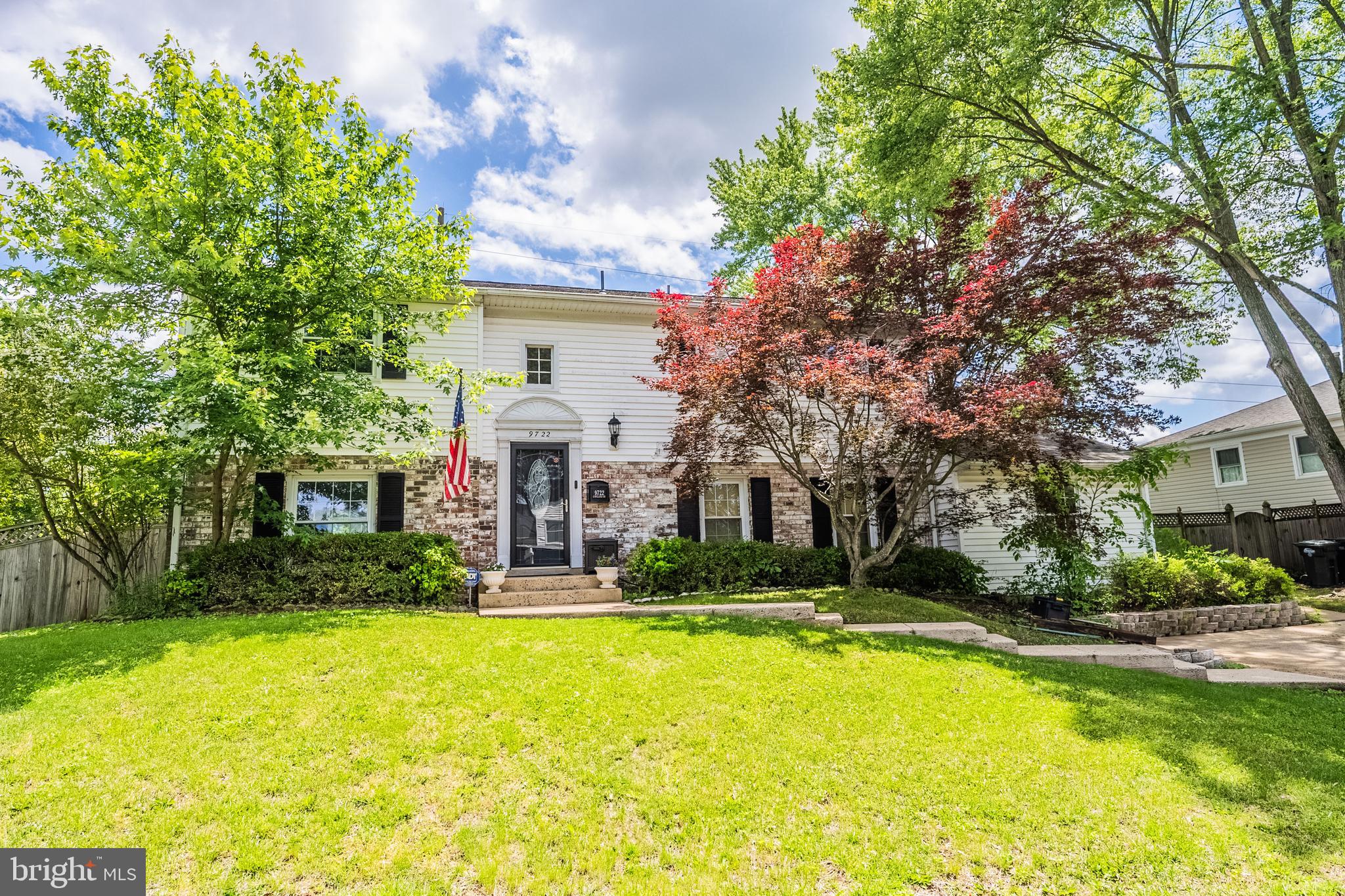 9722 Copeland Drive Manassas, VA 20109 - Photo 2 of 46 a front view of house with yard and trees
