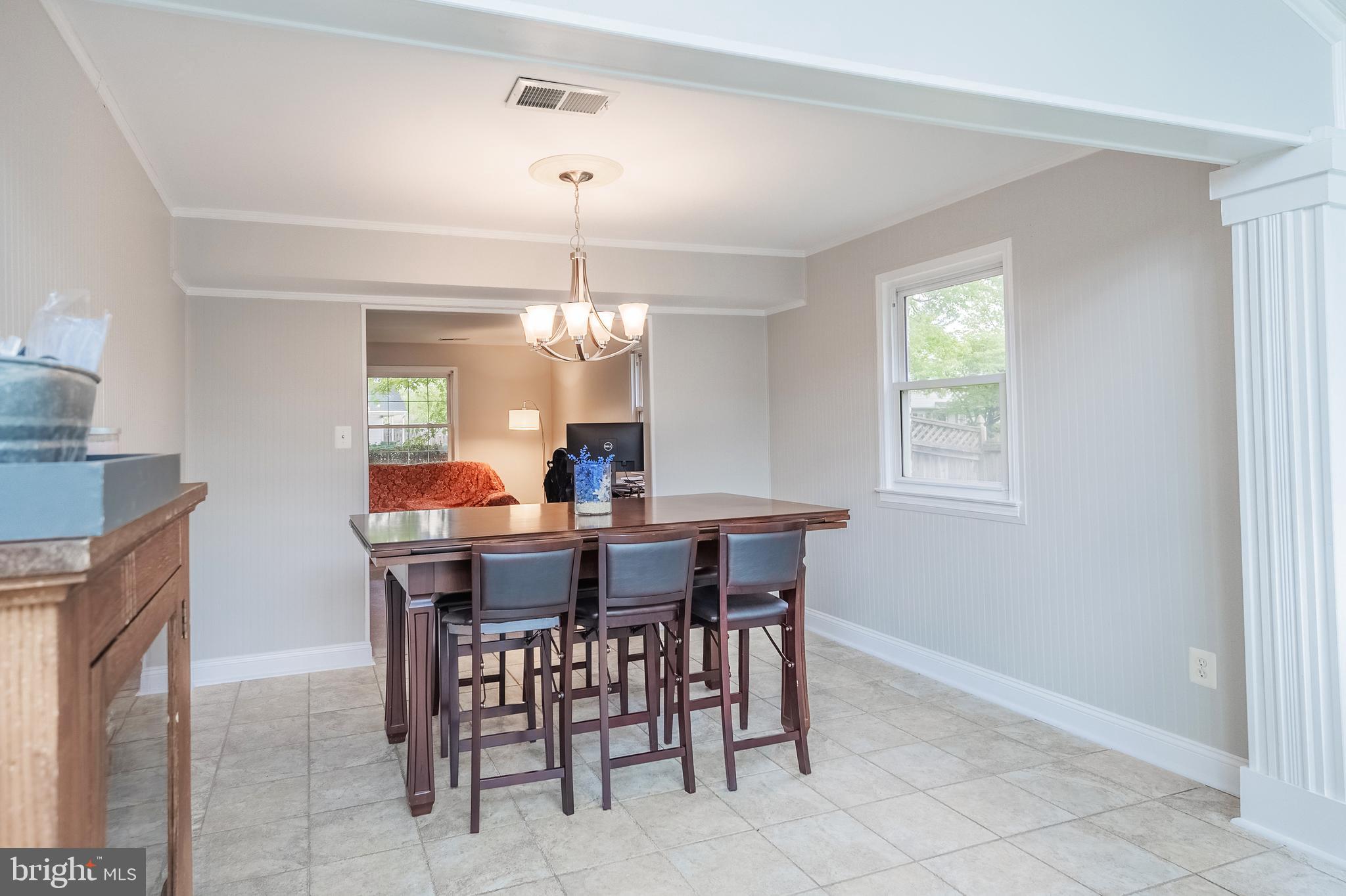 9722 Copeland Drive Manassas, VA 20109 - Photo 22 of 46 a view of a dining room with furniture and chandelier