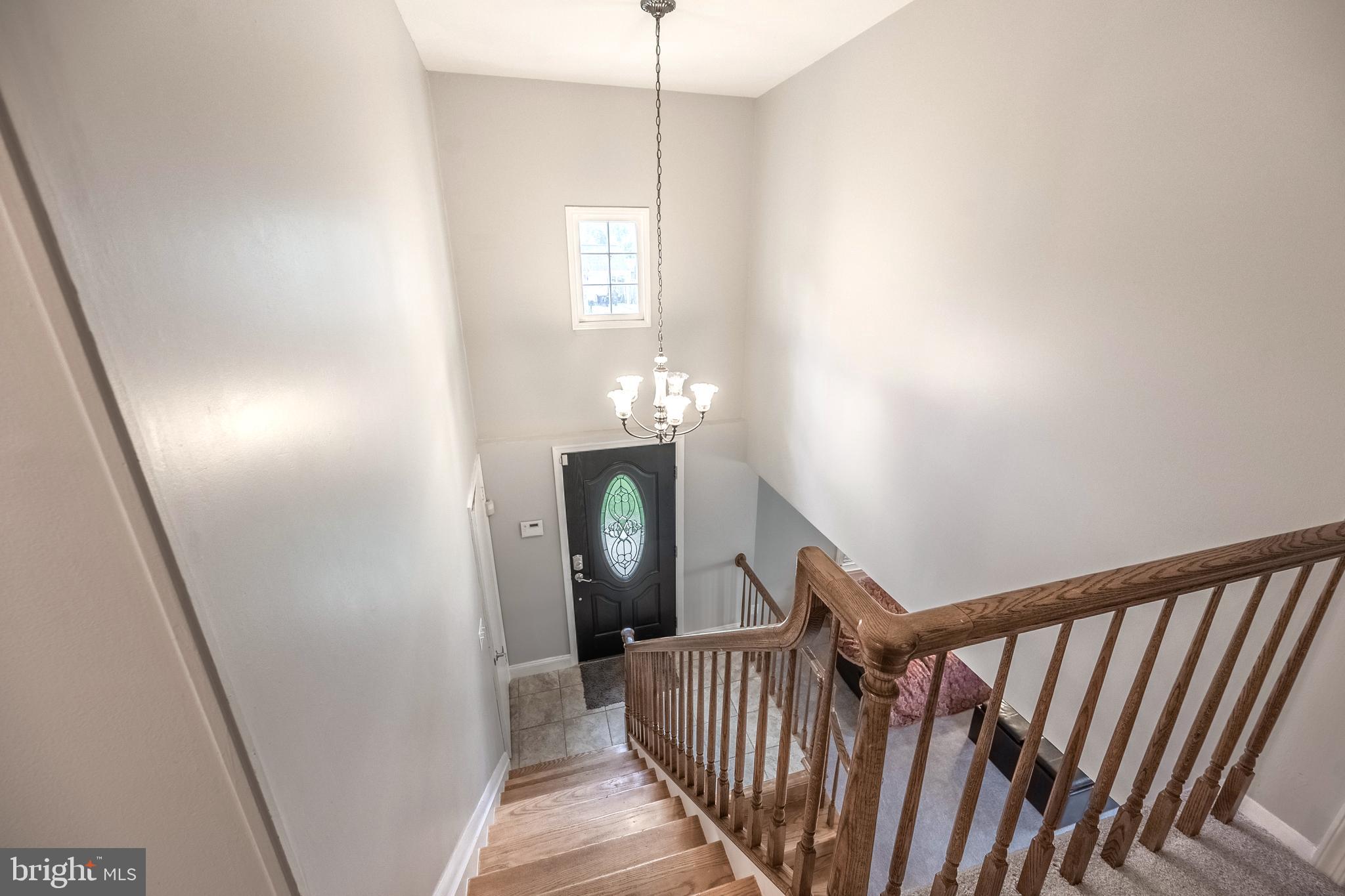 9722 Copeland Drive Manassas, VA 20109 - Photo 35 of 46 a view of a hallway with windows