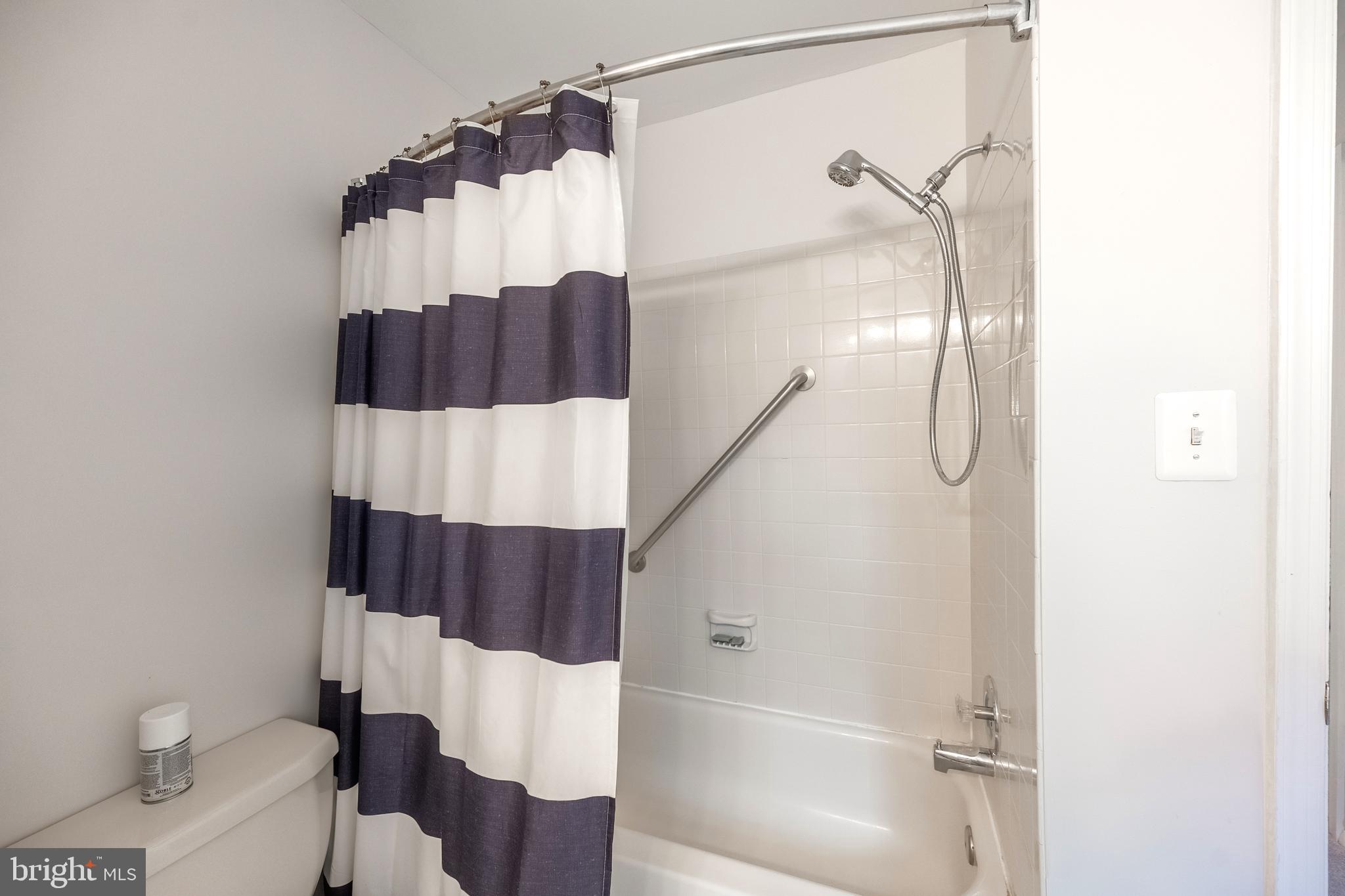 9722 Copeland Drive Manassas, VA 20109 - Photo 42 of 46 a bathroom with a bathtub and a shower