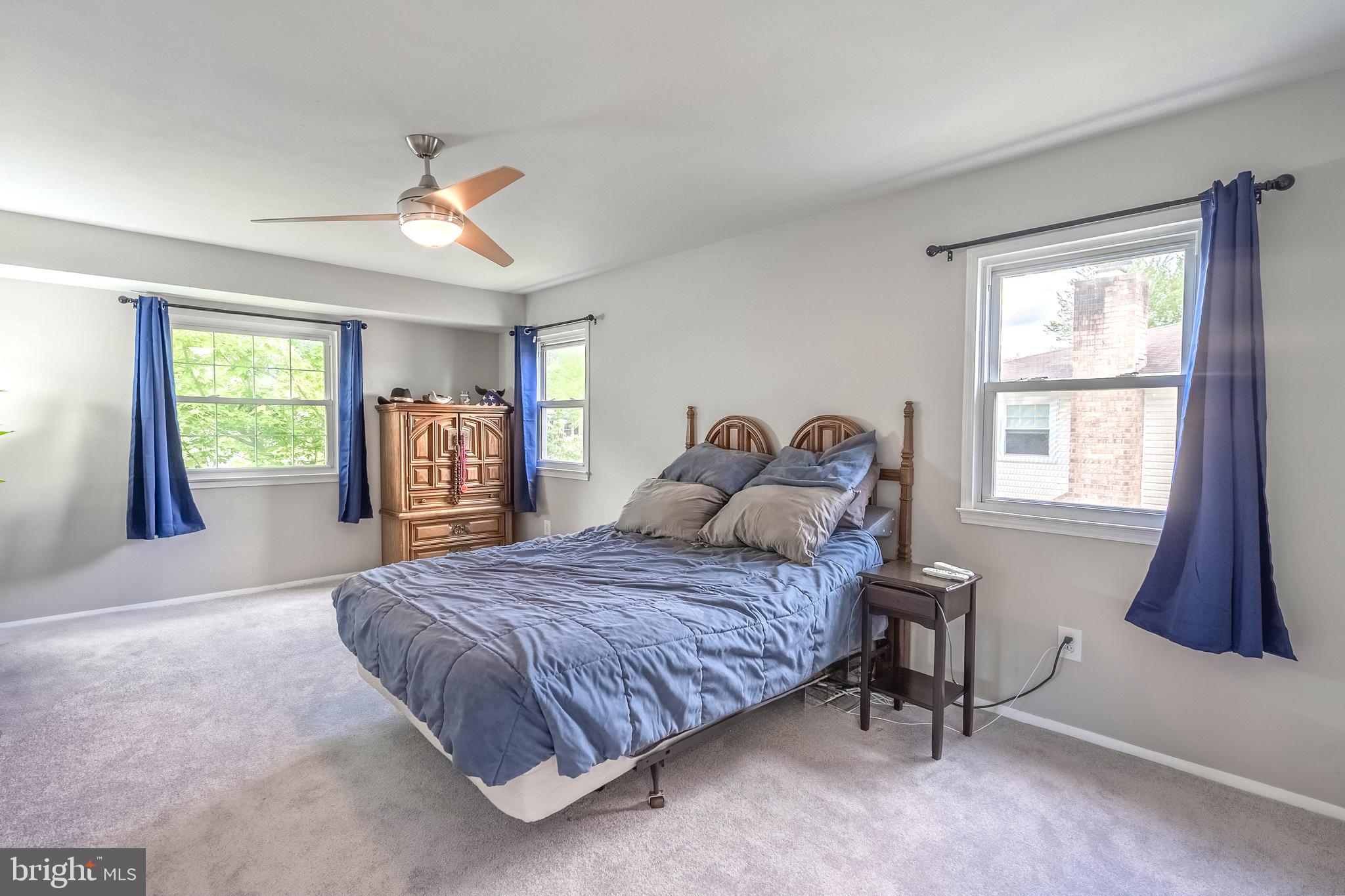 9722 Copeland Drive Manassas, VA 20109 - Photo 43 of 46 a bedroom with a bed and a window