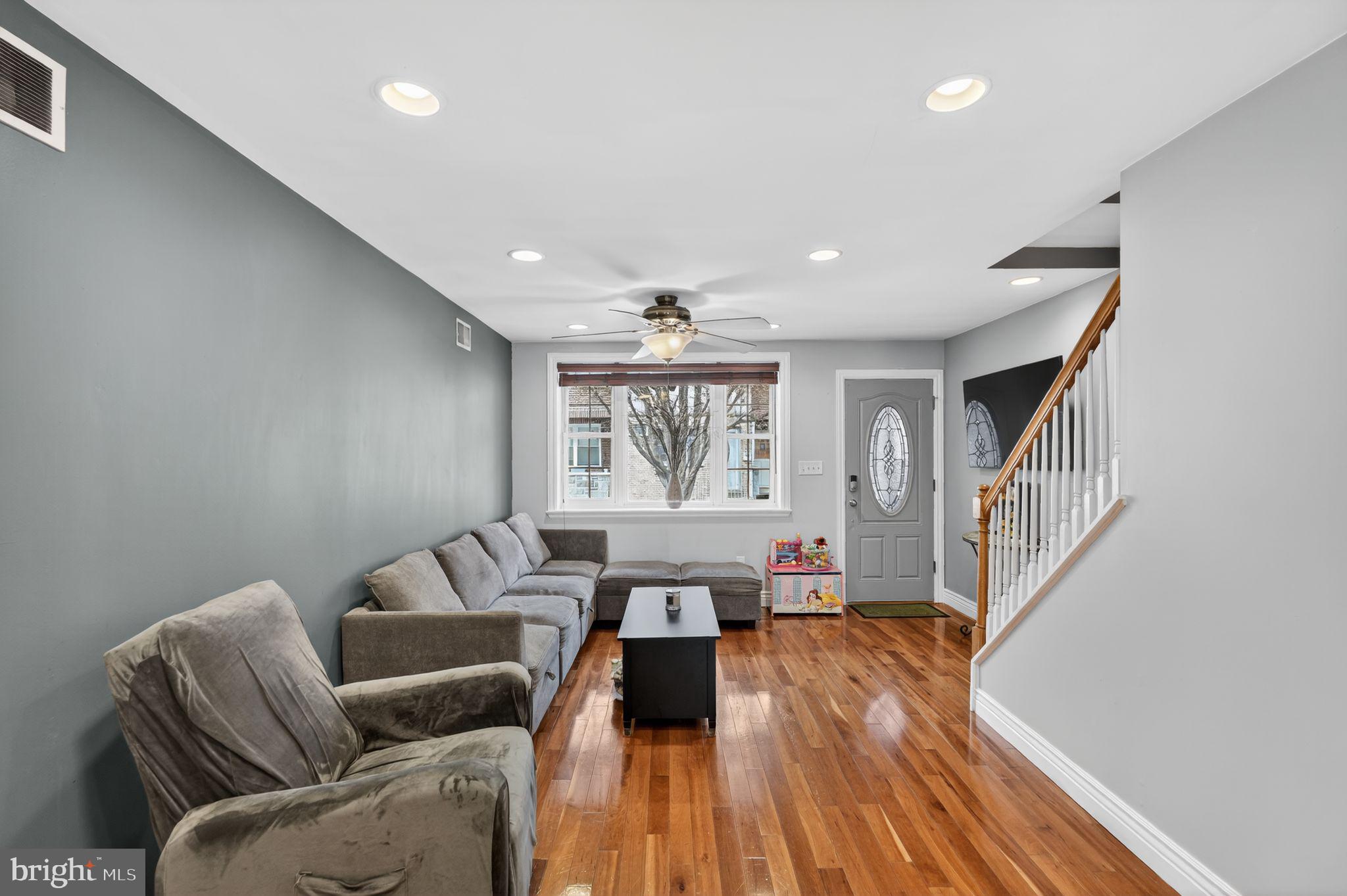 2907 South Sydenham Street Philadelphia, PA 19145 - Photo 2 of 15 a living room with furniture and wooden floor