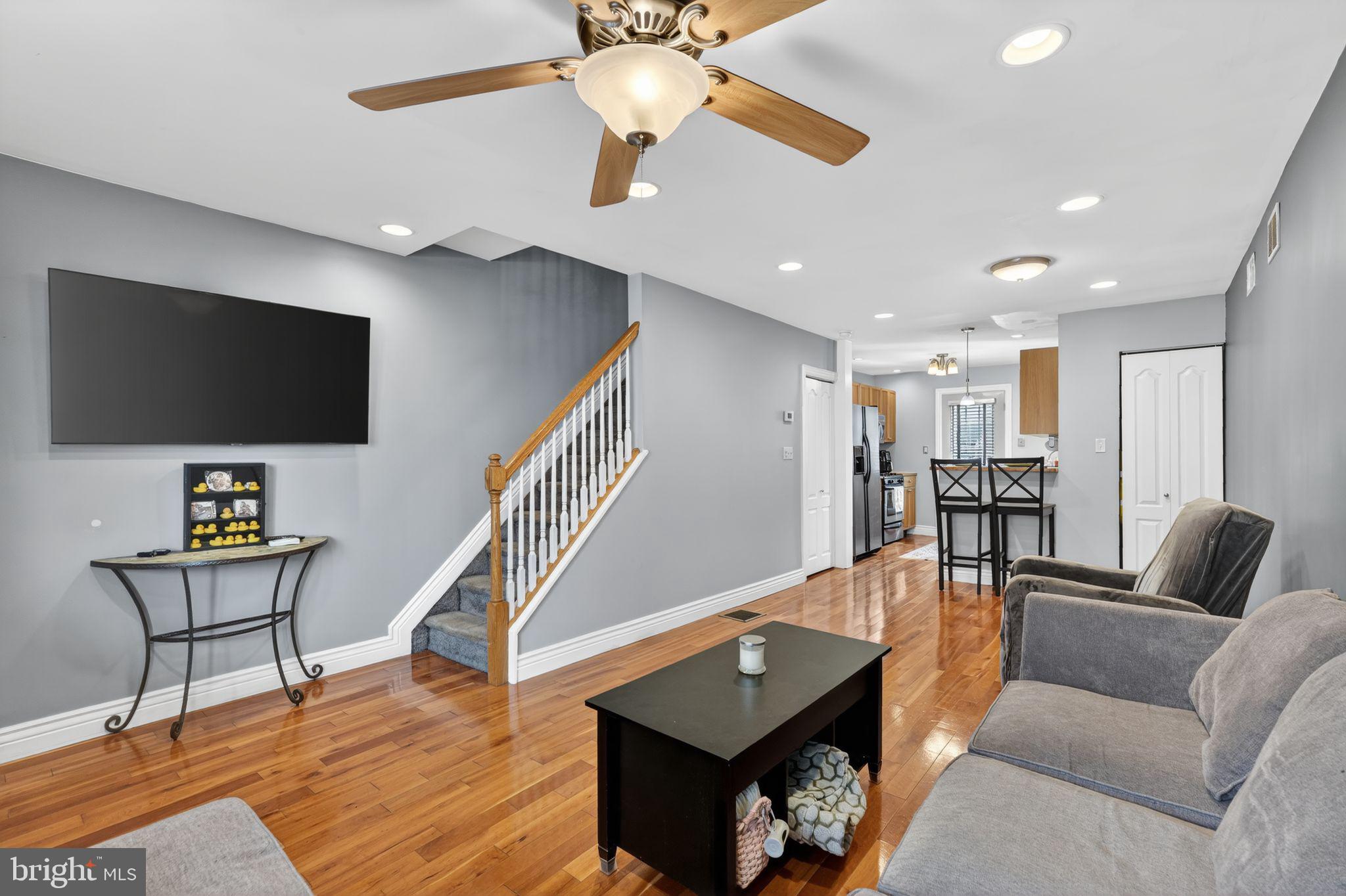 2907 South Sydenham Street Philadelphia, PA 19145 - Photo 3 of 15 a living room with furniture and a flat screen tv