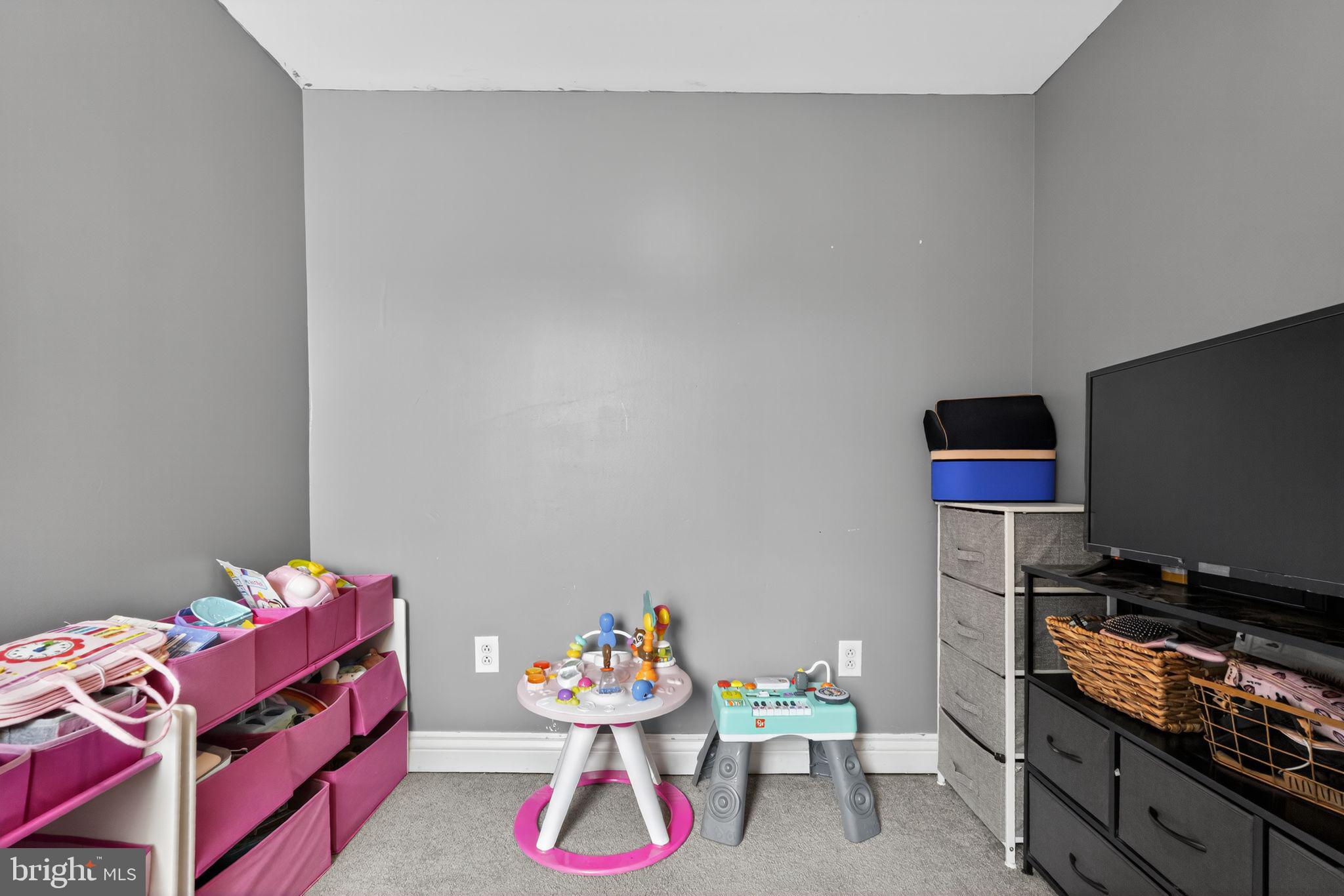 2907 South Sydenham Street Philadelphia, PA 19145 - Photo 9 of 15 a room with toys and a table