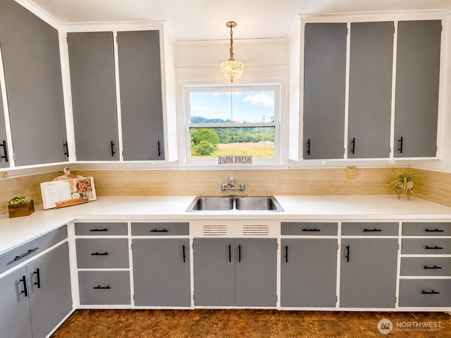 2154 Cranberry Road Grayland, WA 98547 - Photo 9 of 38 a view of a kitchen with a sink and a window