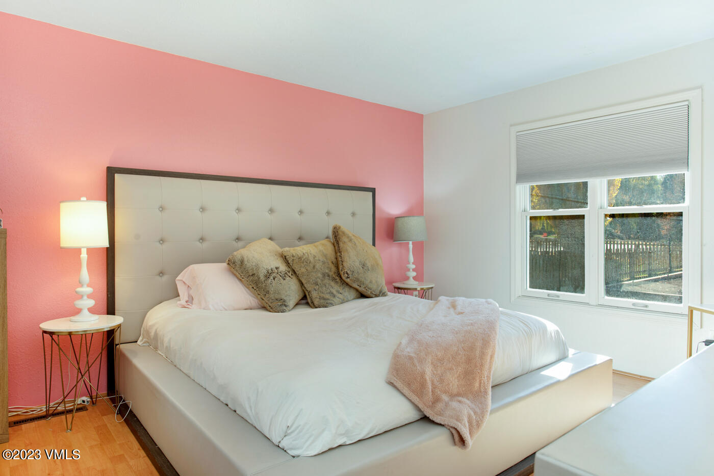 503 Park View Lane Gypsum, CO 81637 - Photo 2 of 24 a large bed sitting in a bedroom next to a window
