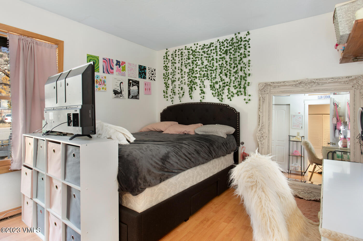 503 Park View Lane Gypsum, CO 81637 - Photo 5 of 24 a bedroom with a bed and a flat screen tv