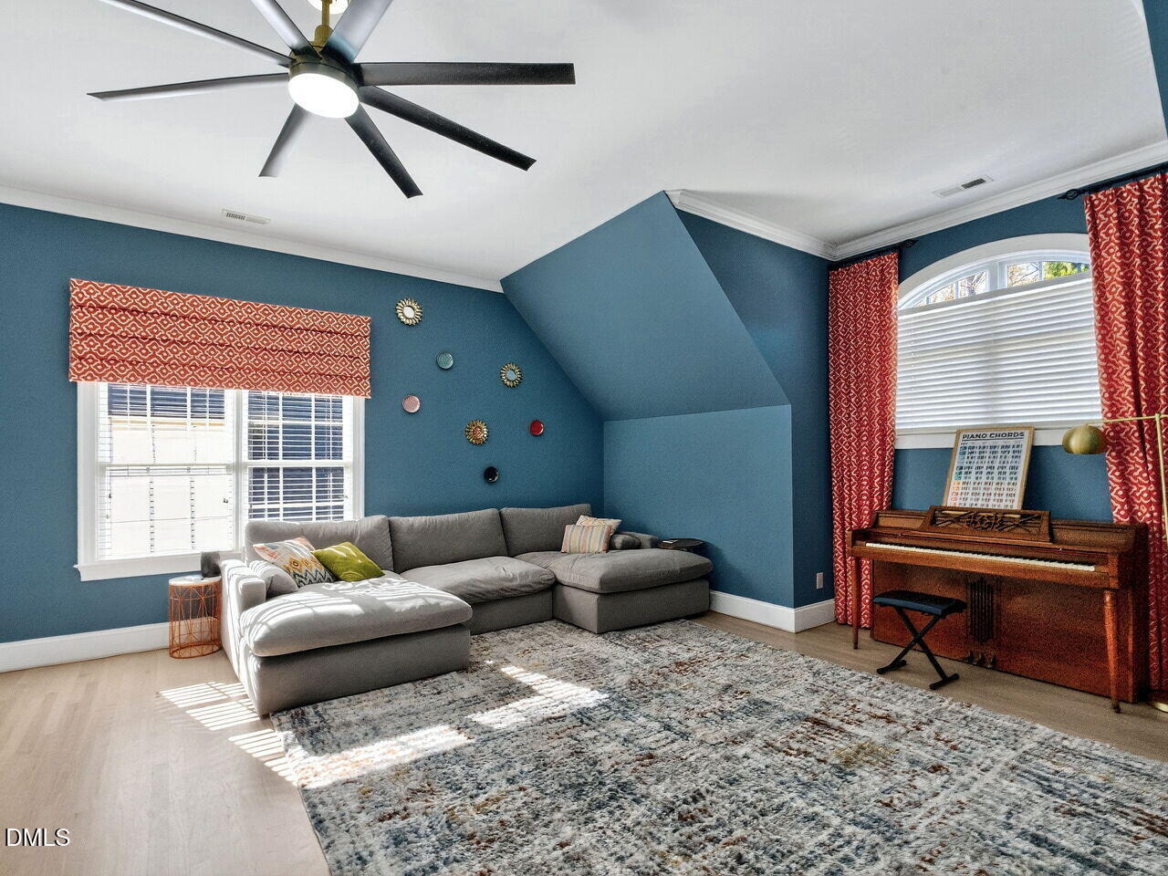 7208 Rippling Stone Lane Raleigh, NC 27612 - Photo 31 of 57 a living room with furniture and a window