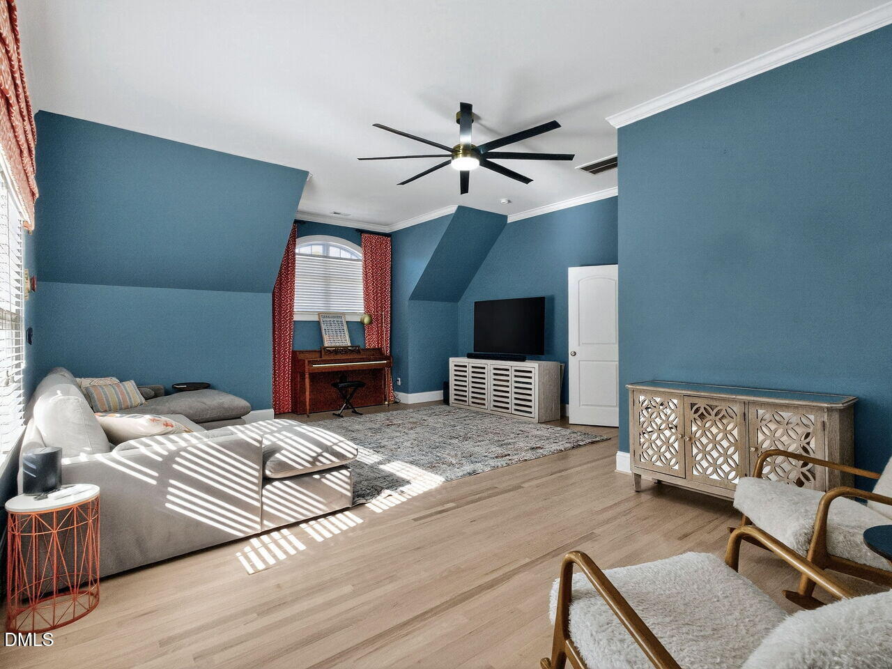 7208 Rippling Stone Lane Raleigh, NC 27612 - Photo 33 of 57 a bedroom with furniture and a wooden floor