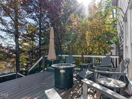 a view of a balcony with furniture