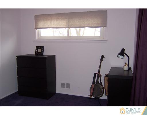 51 Westminster Road Colonia, NJ 07067 - Photo 12 of 25 a view of a room with gym equipment