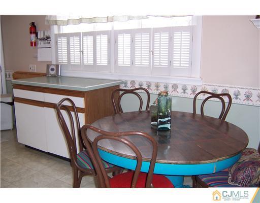 51 Westminster Road Colonia, NJ 07067 - Photo 6 of 25 a view of a dining room with furniture and window