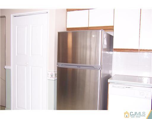 51 Westminster Road Colonia, NJ 07067 - Photo 7 of 25 a bathroom with a shower