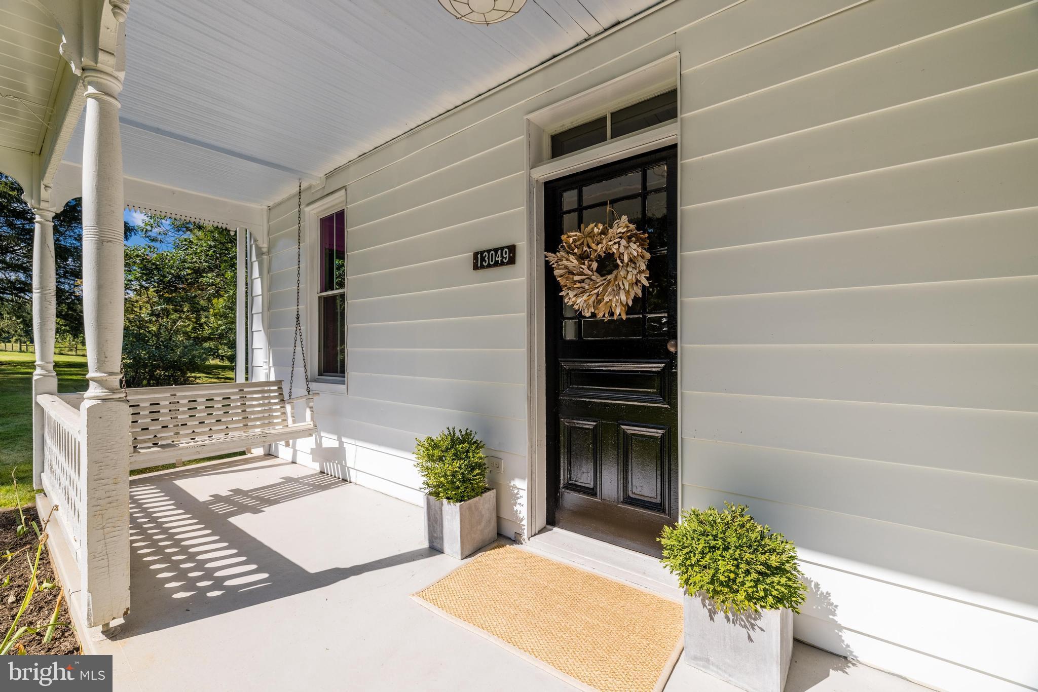 13049 Loyalty Road Leesburg, VA 20176 - Photo 5 of 79 Front Sitting Porch