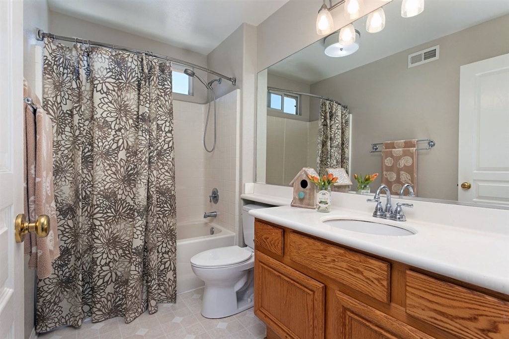 3530 Harwich Drive Carlsbad, CA 92010 - Photo 15 of 25 a bathroom with a sink toilet and shower