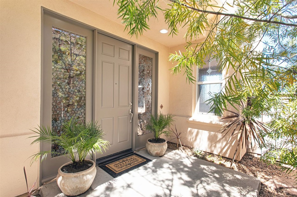 3530 Harwich Drive Carlsbad, CA 92010 - Photo 4 of 25 a view of a backyard with plants and a potted plant