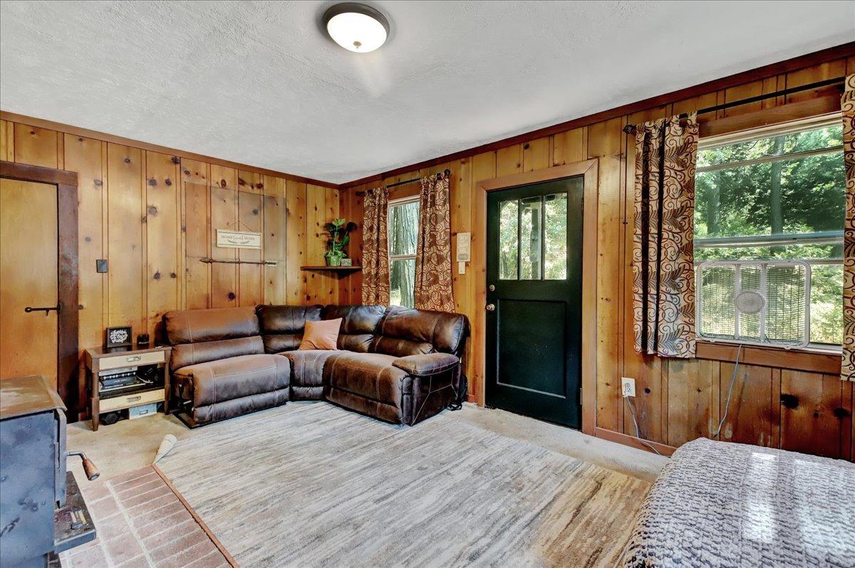 778-758 Sawmill Road Alta, CA 95701 - Photo 26 of 46 a bedroom with a large bed couch and a window
