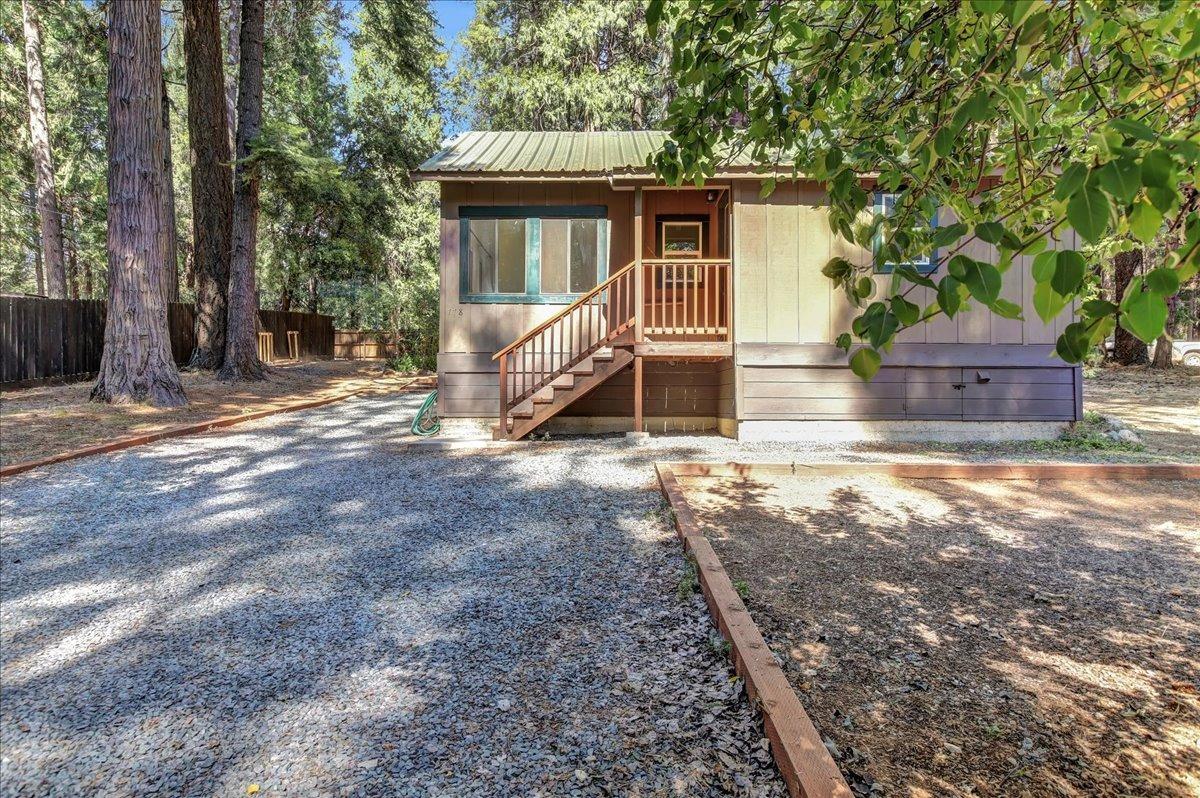 778-758 Sawmill Road Alta, CA 95701 - Photo 7 of 46 a view of a house with backyard and trees