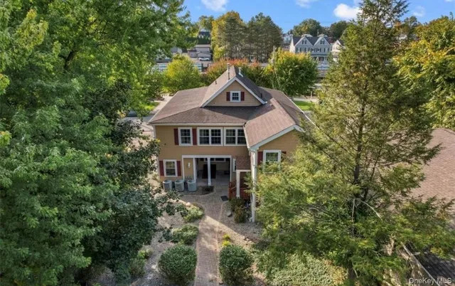 a house with trees in the background