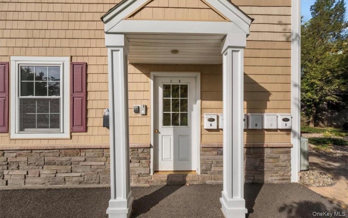 10 Burnside Avenue, Unit F Congers, NY 10920 - Photo 3 of 12 a front view of a house with a shower