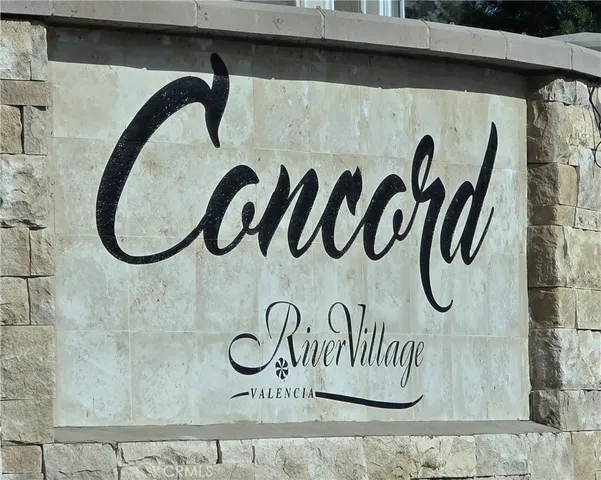 a view of house with outdoor space and trees