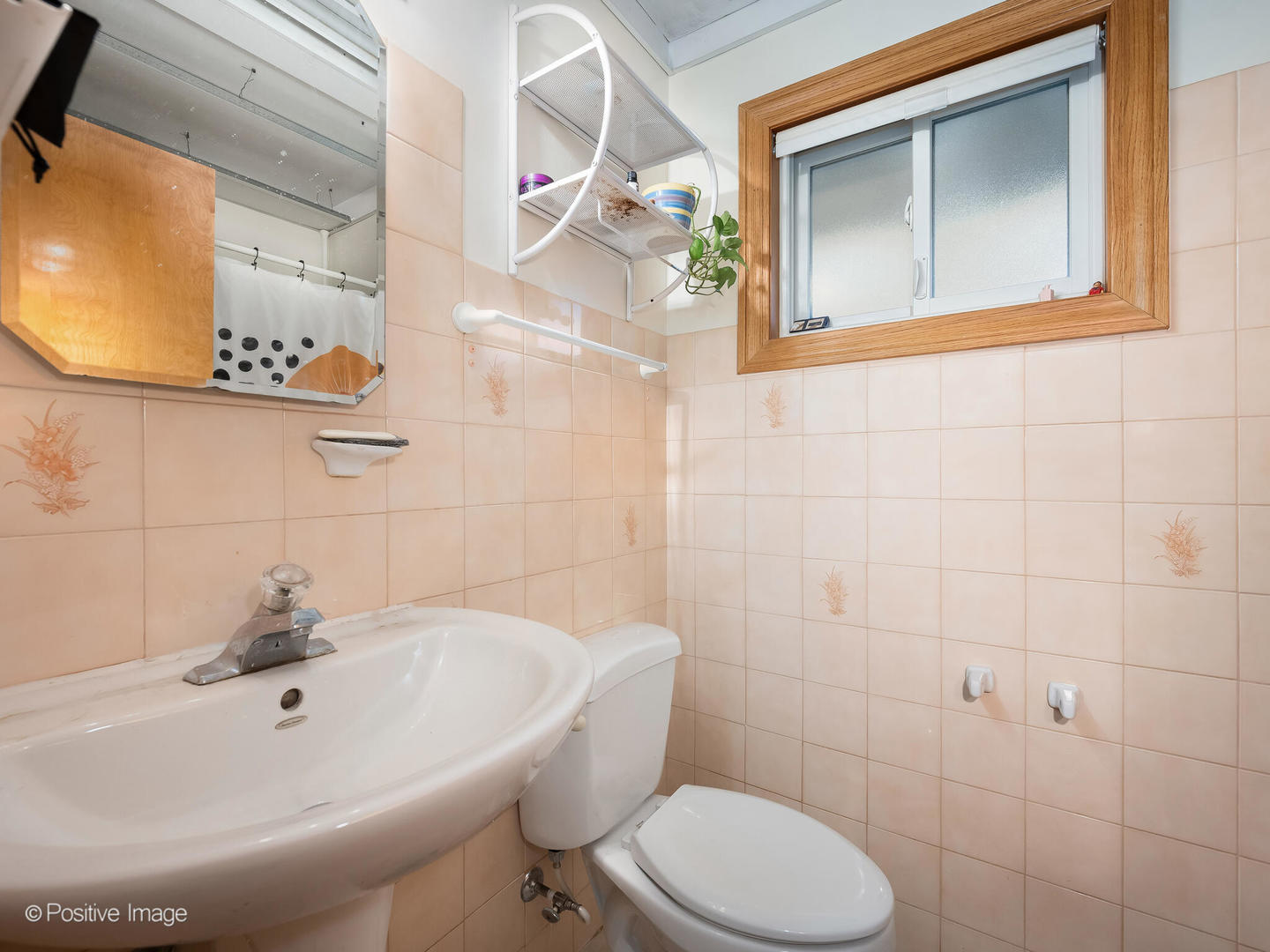 18646 Palmer Circle Homewood, IL 60430 - Photo 8 of 17 a white toilet sitting next to a bathroom sink