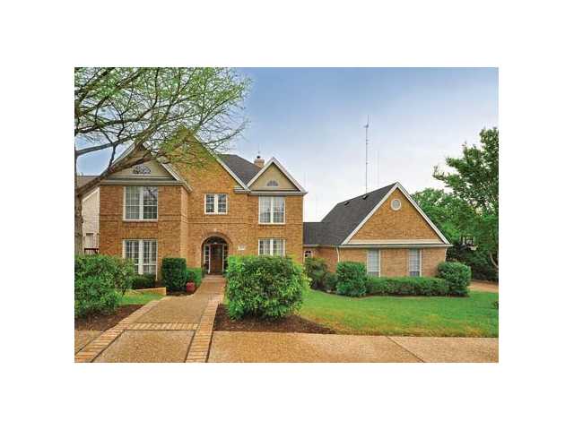 3105 Riva Ridge Road Austin, TX 78746 - Photo 1 of 1 a front view of a house with a yard