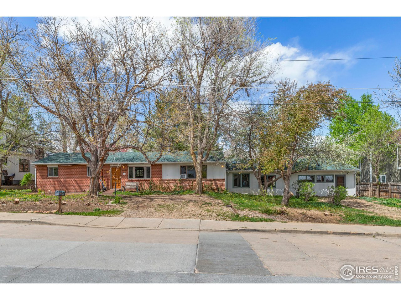 855 Union Avenue Boulder, CO 80304 - Photo 2 of 21 a front view of a building with trees and buildings
