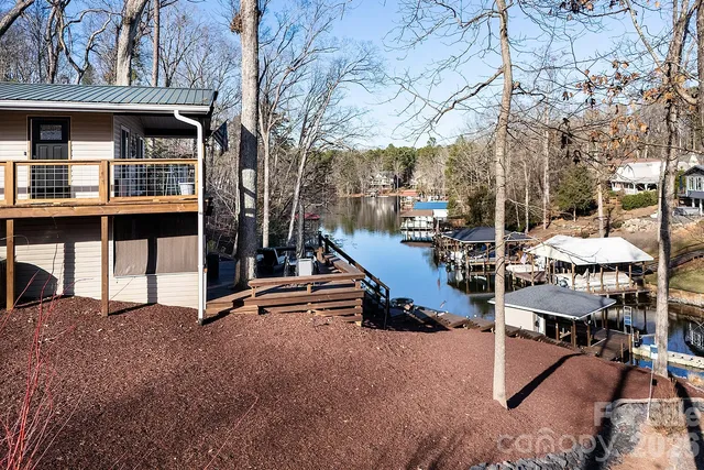 a view of a chairs and table in the patio