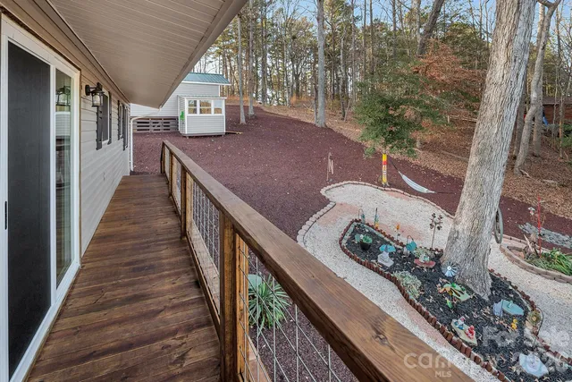 a view of a house with backyard