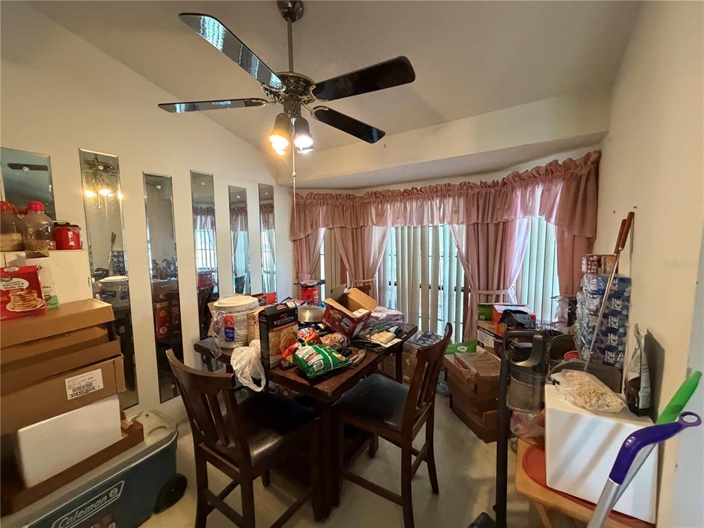 9 Hialeah Drive Ocala, FL 34482 - Photo 15 of 41 a view of a dining room with furniture and window