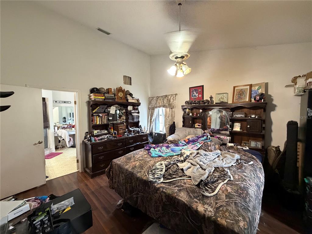 9 Hialeah Drive Ocala, FL 34482 - Photo 20 of 41 a living room with hard wood flooring and a couch