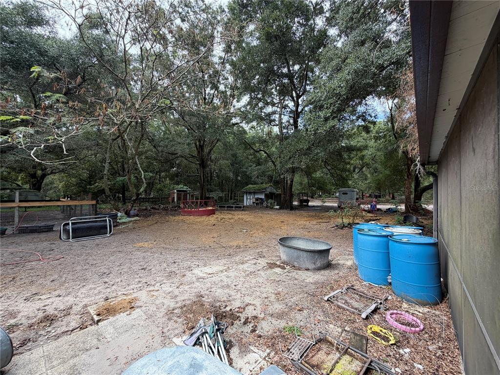 9 Hialeah Drive Ocala, FL 34482 - Photo 38 of 41 a view of backyard with sitting space