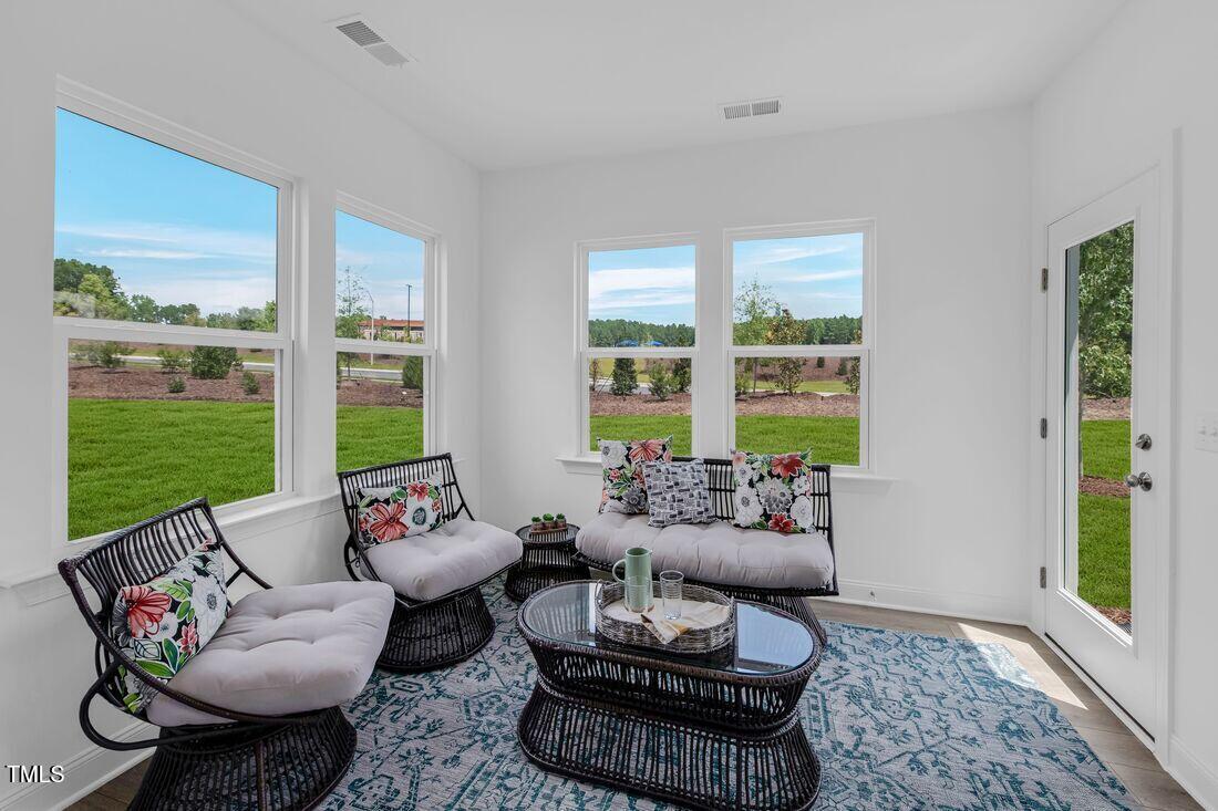 249 Tidal Pool Way Cary, NC 27519 - Photo 3 of 23 a living room with furniture and a window