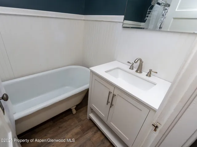 a bathroom with a sink and a bathtub