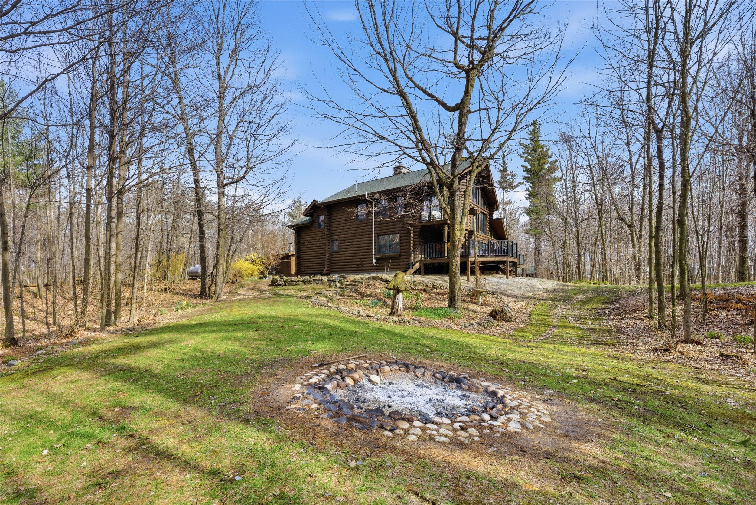 9020 Marken Road Liberty, WI 54245 - Photo 44 of 77 North View of House & Firepit