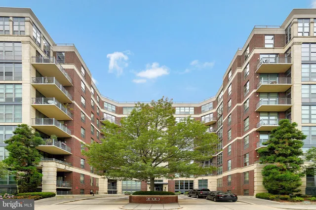 a view of a buildings with a street