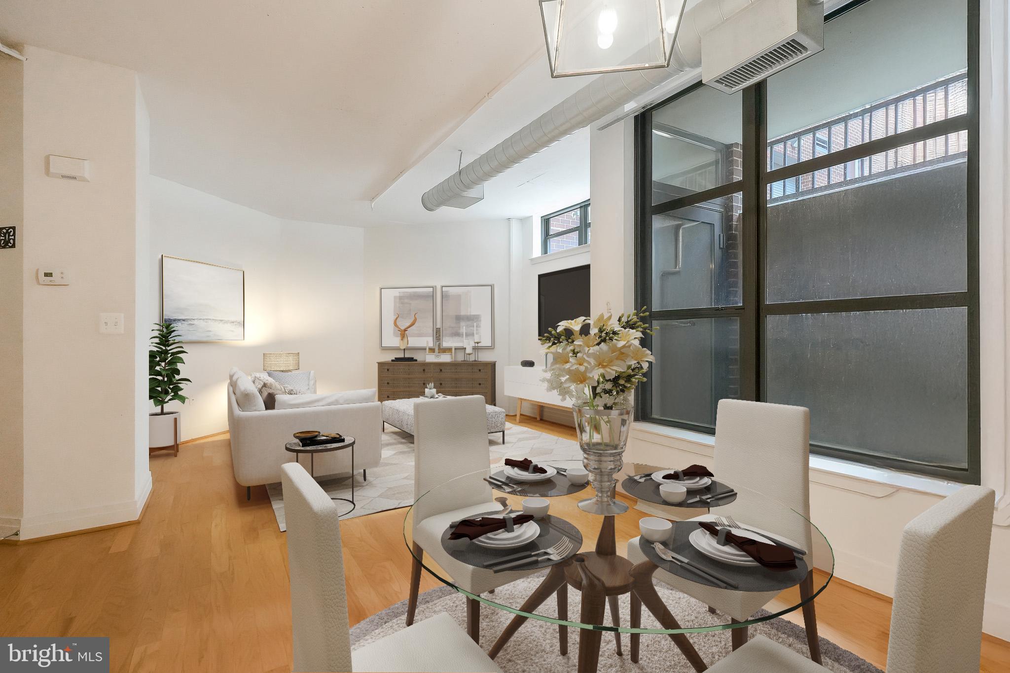2020 12th Street Northwest, Unit T05 Washington, DC 20009 - Photo 22 of 38 a living room with fireplace furniture and a wooden floor