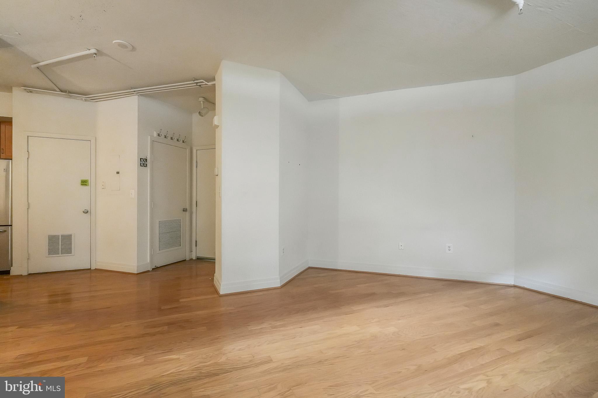 2020 12th Street Northwest, Unit T05 Washington, DC 20009 - Photo 26 of 38 a view of an empty room