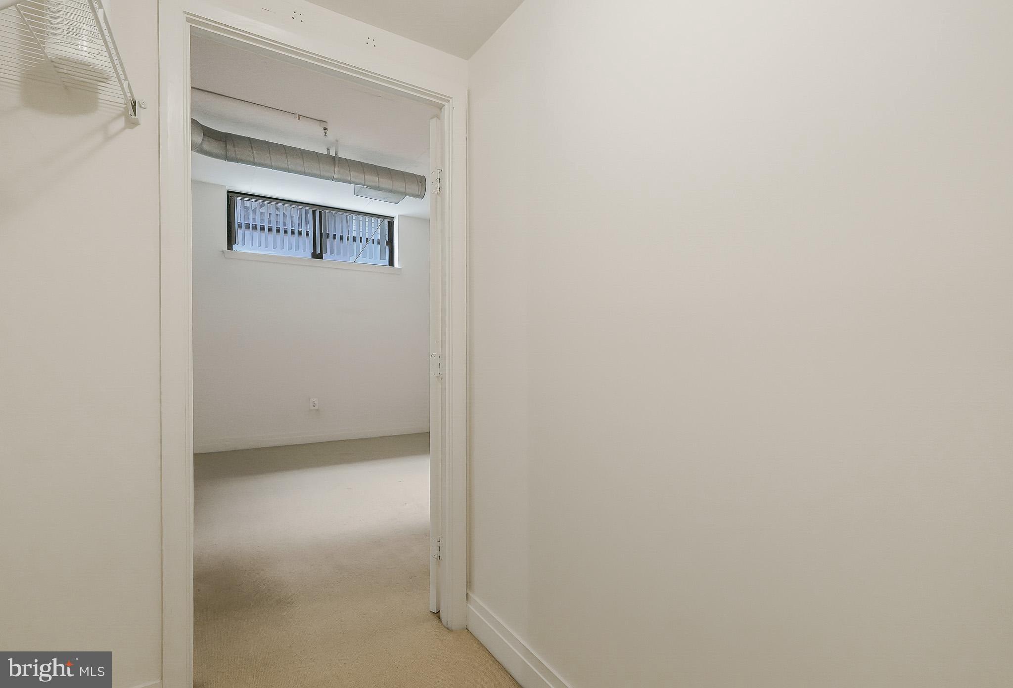 2020 12th Street Northwest, Unit T05 Washington, DC 20009 - Photo 35 of 38 a view of an empty room