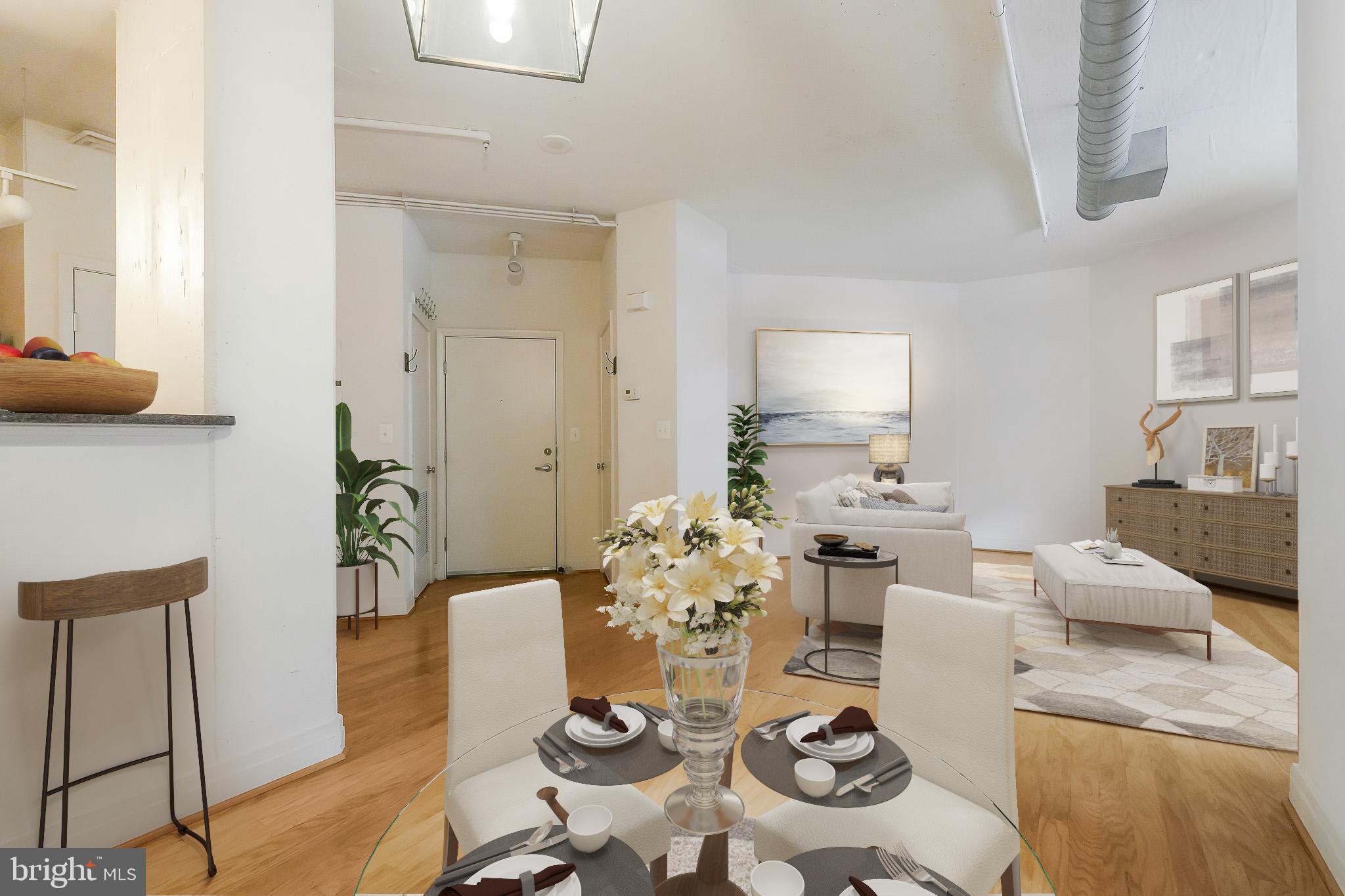 2020 12th Street Northwest, Unit T05 Washington, DC 20009 - Photo 36 of 38 a living room with furniture and wooden floor