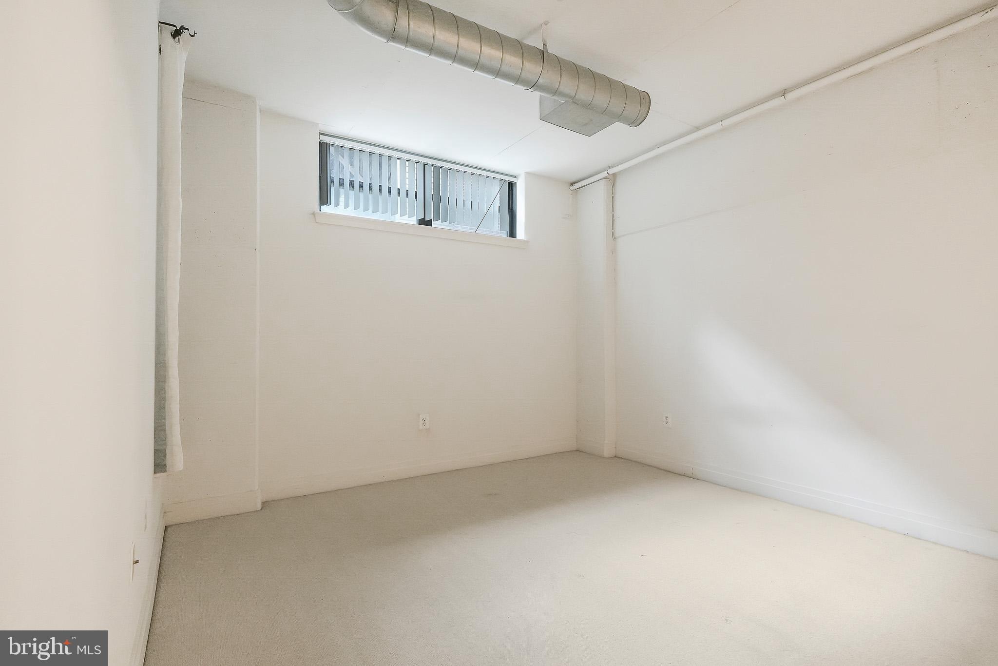 2020 12th Street Northwest, Unit T05 Washington, DC 20009 - Photo 38 of 38 a view of an empty room