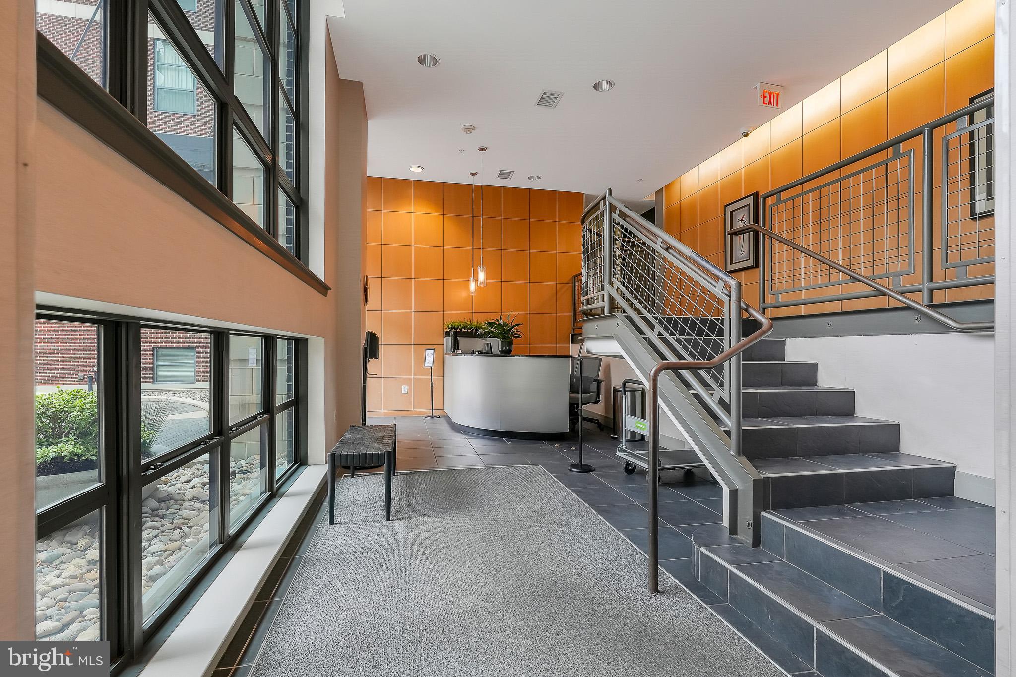 2020 12th Street Northwest, Unit T05 Washington, DC 20009 - Photo 7 of 38 a view of entryway and hall with wooden floor