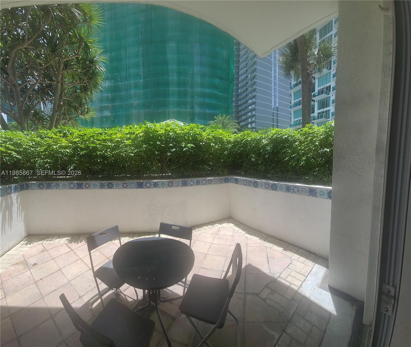 31 Southeast 5th Street, Unit 1110 Miami, FL 33131 - Photo 13 of 61 Balcony - View to Pool and Garden