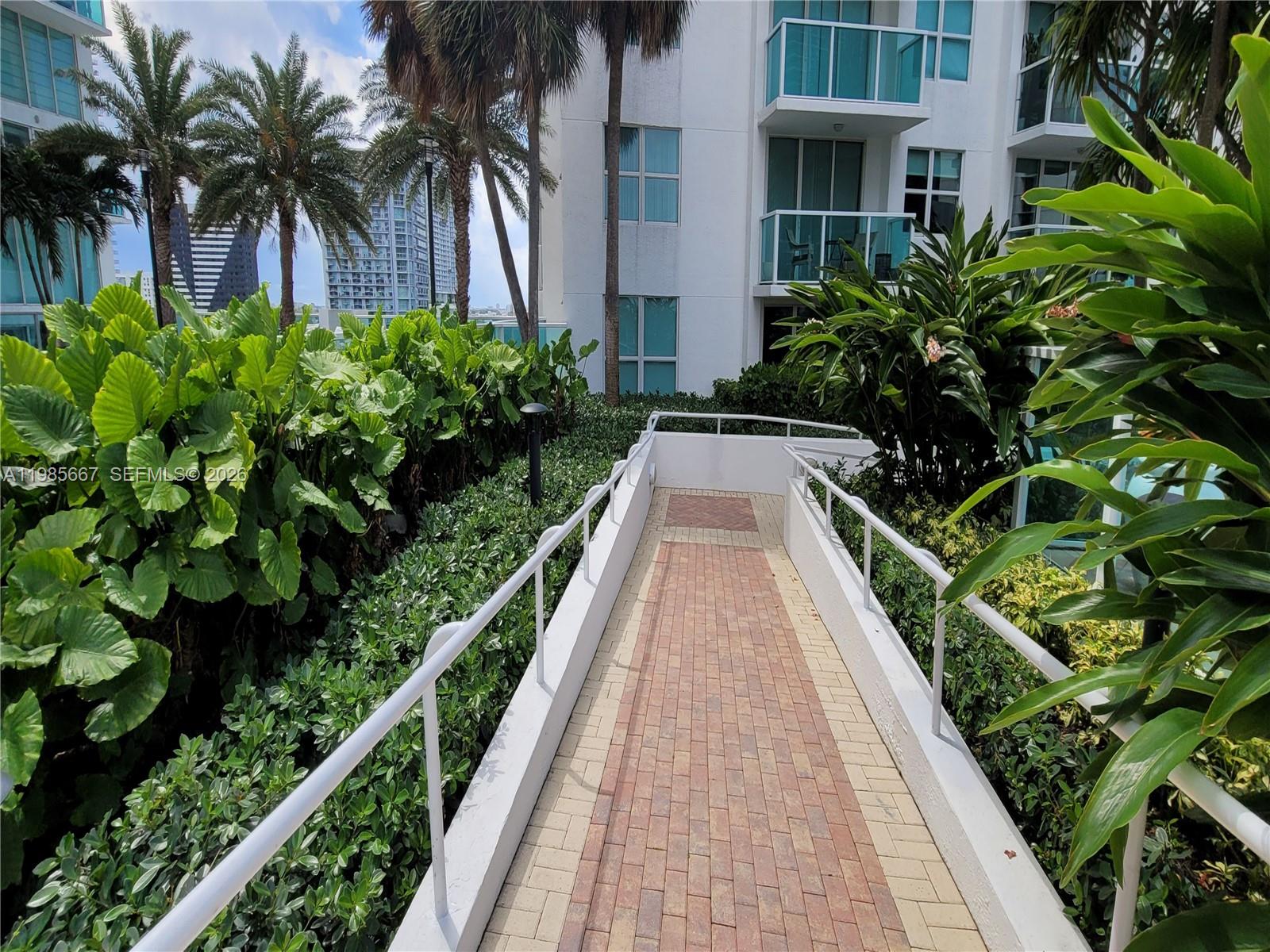 31 Southeast 5th Street, Unit 1110 Miami, FL 33131 - Photo 18 of 61 Walking to Pool from the Unit Floor