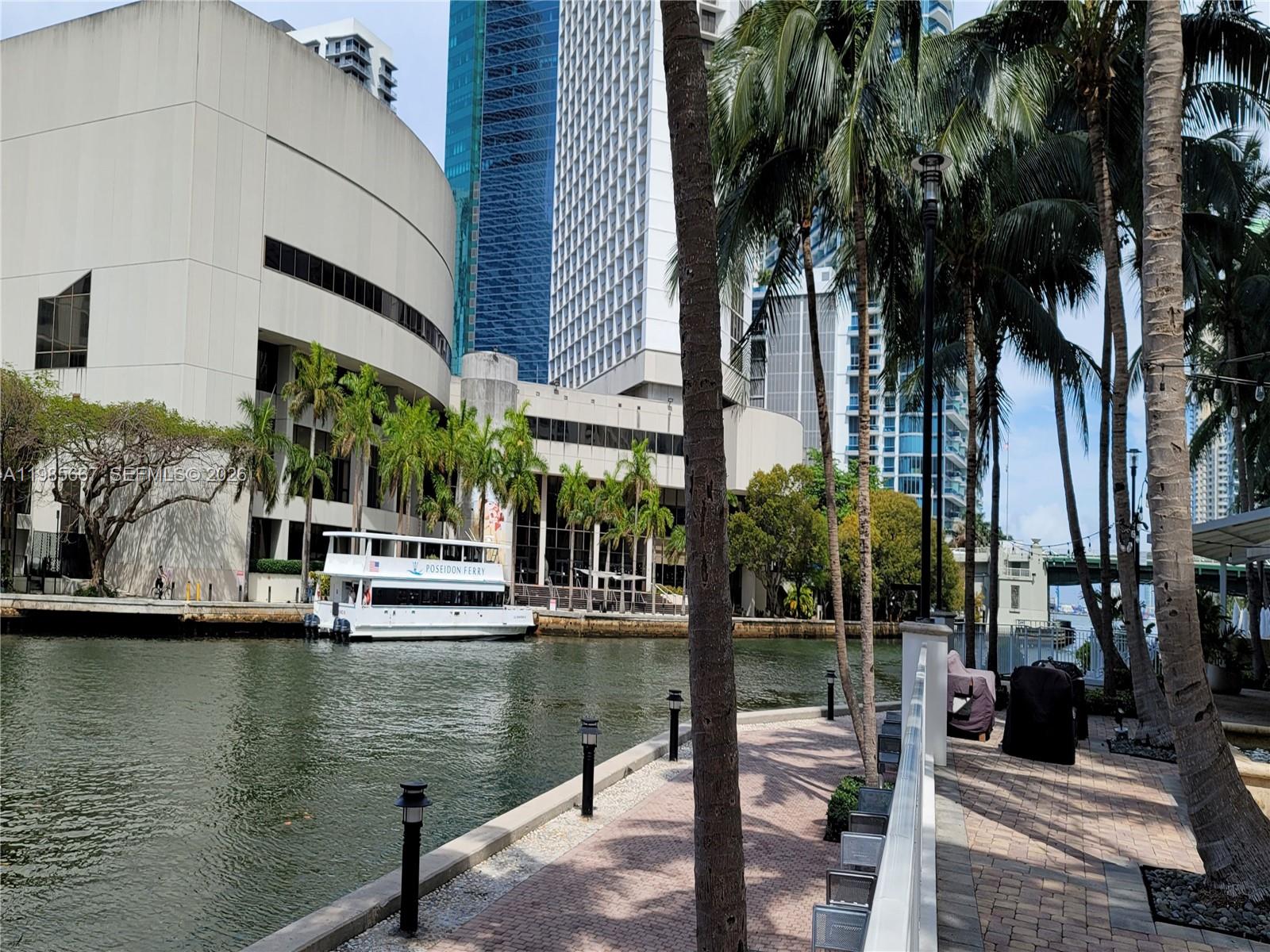 31 Southeast 5th Street, Unit 1110 Miami, FL 33131 - Photo 28 of 61 a view of a lake with palm trees