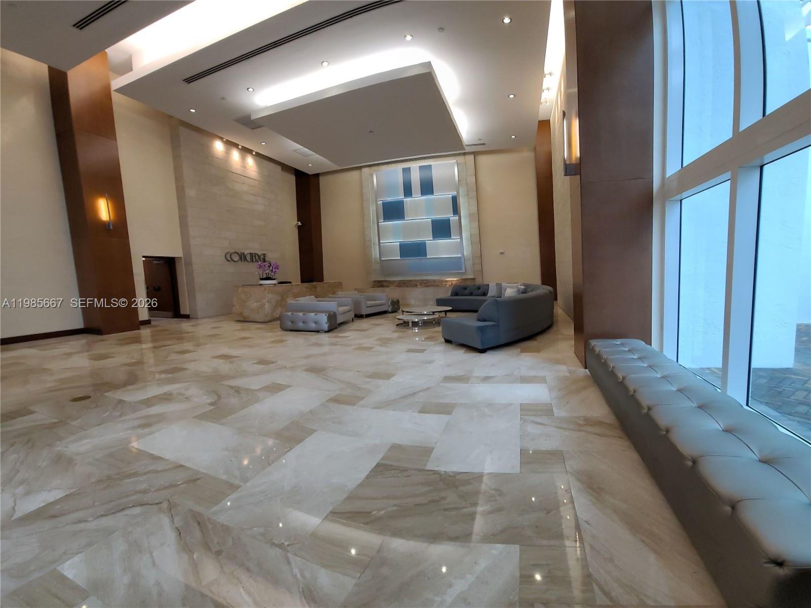 31 Southeast 5th Street, Unit 1110 Miami, FL 33131 - Photo 31 of 61 a view of a lobby with furniture