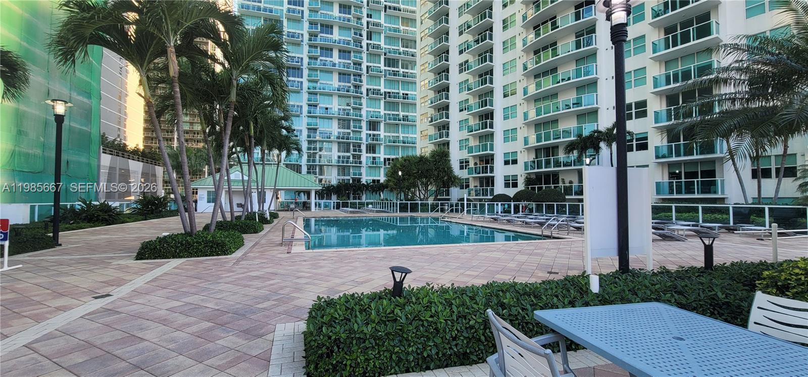 31 Southeast 5th Street, Unit 1110 Miami, FL 33131 - Photo 46 of 61 a view of a building with a yard